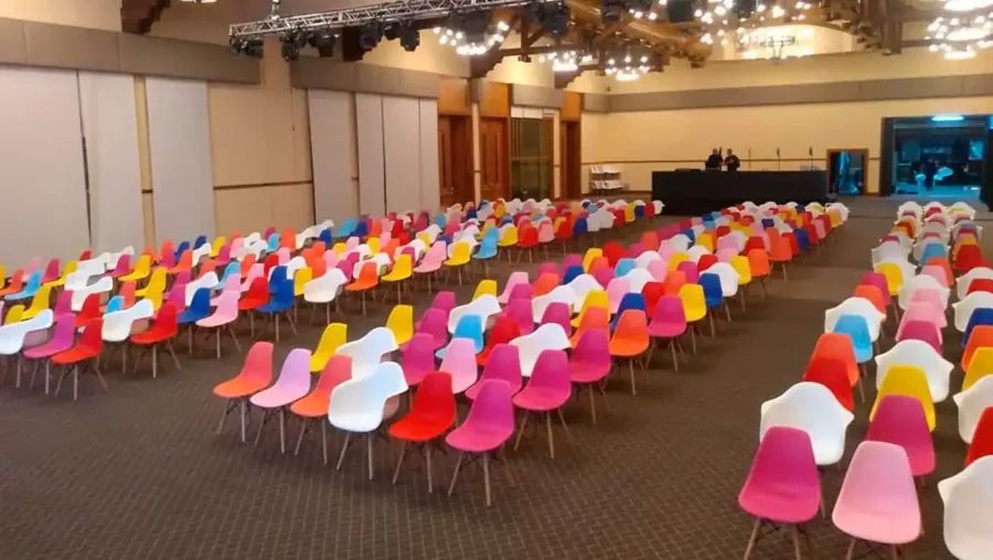 Colourful design chairs arranged for an event